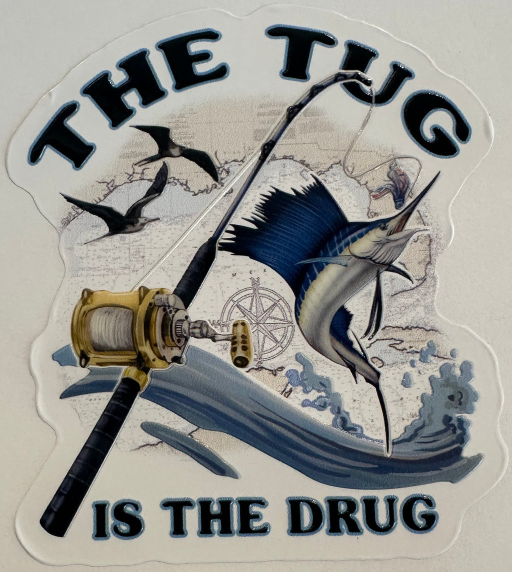 The Tug Is The Drug sailfish embossed fishing sticker with rod, reel, waves, and offshore artwork.